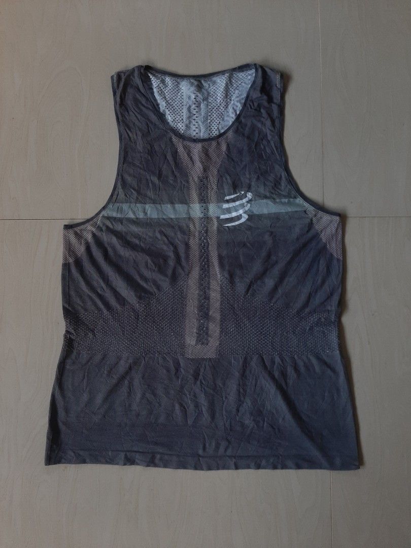 Compressport Training Singlet Tank Top Grey (Category: Activewear) located in Himamaylan. Submitted by thriftsouth6108 (Listing ID 1467989343, Image 2). Description: Compressport Pro Racing Singlet Black - Canotta Running Dimensions: 18.5 x 26.5 (Stretchable fabric) As new No issue Can do shipping nationwide J&T courier Compressport athletic tank top in grey. Breathable mesh panels across the chest and back for intense runs and workouts. Lightwei