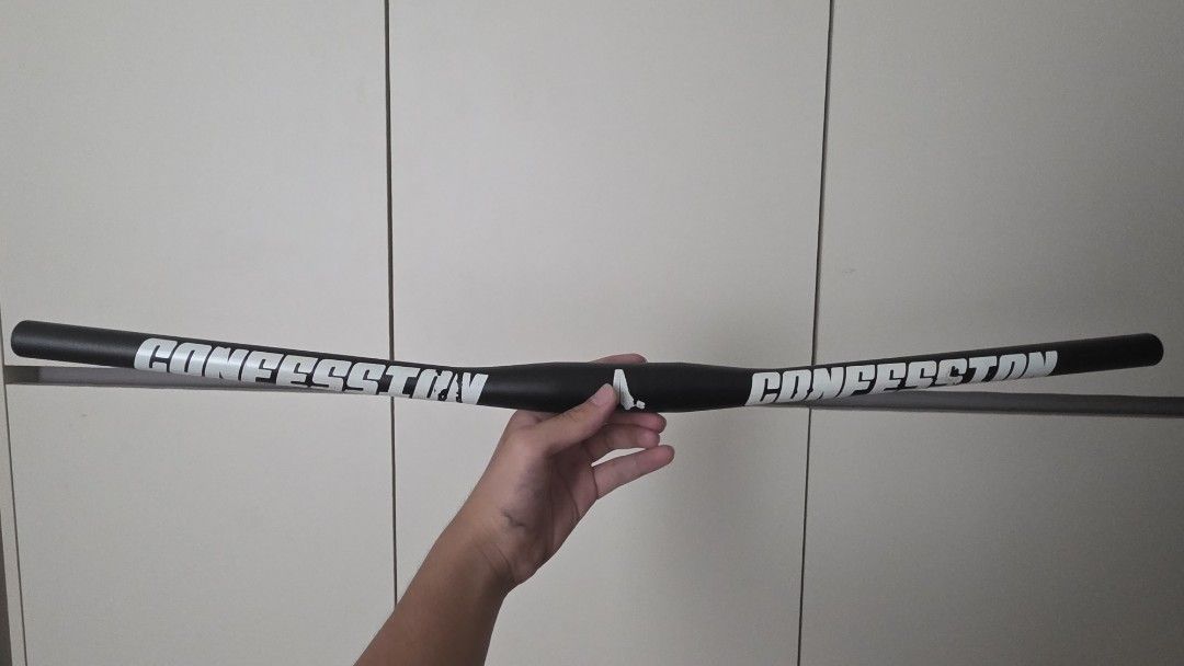 Confession riser (Category: Parts & Accessories) located in Singapore. Submitted by granib (Listing ID 1467927943, Image 1). Description: Confession riser bar Minor scratches and scuffs on the bar ends and lettering Good for trickster build .