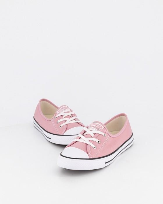 Converse All Star Chuck Taylor Ballet slip (Category: Sneakers) located in Juban. Submitted by cosmicfire.40794b (Listing ID 1468053244, Image 1). Description: Converse All Star low top sneakers in a dusty pink canvas colorway. White rubber toe cap and midsole with black piping details. White lace-up front with metal eyelets. Classic brown diamond tread rubber outsole. Clean interior lining with branded heel patch. Great casual everyday footwear 