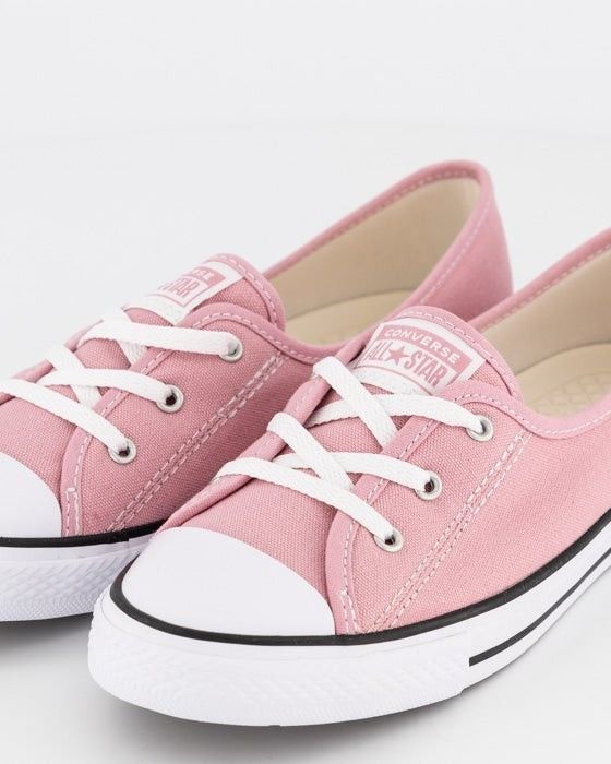 Converse All Star Chuck Taylor Ballet slip (Category: Sneakers) located in Juban. Submitted by cosmicfire.40794b (Listing ID 1468053244, Image 2). Description: Converse All Star low top sneakers in a dusty pink canvas colorway. White rubber toe cap and midsole with black piping details. White lace-up front with metal eyelets. Classic brown diamond tread rubber outsole. Clean interior lining with branded heel patch. Great casual everyday footwear 