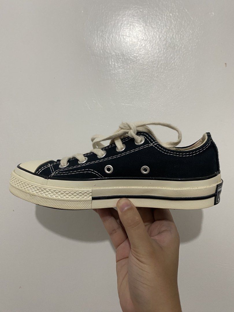 Converse Chuck 70 Low Black Sneakers (Category: Sneakers) located in Abucay. Submitted by vast.joselito_tan (Listing ID 1468032088, Image 1). Description: - Brand/Model: Converse Low Top Sneakers - Color: Black canvas with cream laces, toe cap, and vintage-style midsole - Details: Classic black piping and white contrast stitching - Size: US 3 / UK 3 / EUR 35 / 220 MM - Condition: Clean interiors and soles, great overall condition - Style: Versati