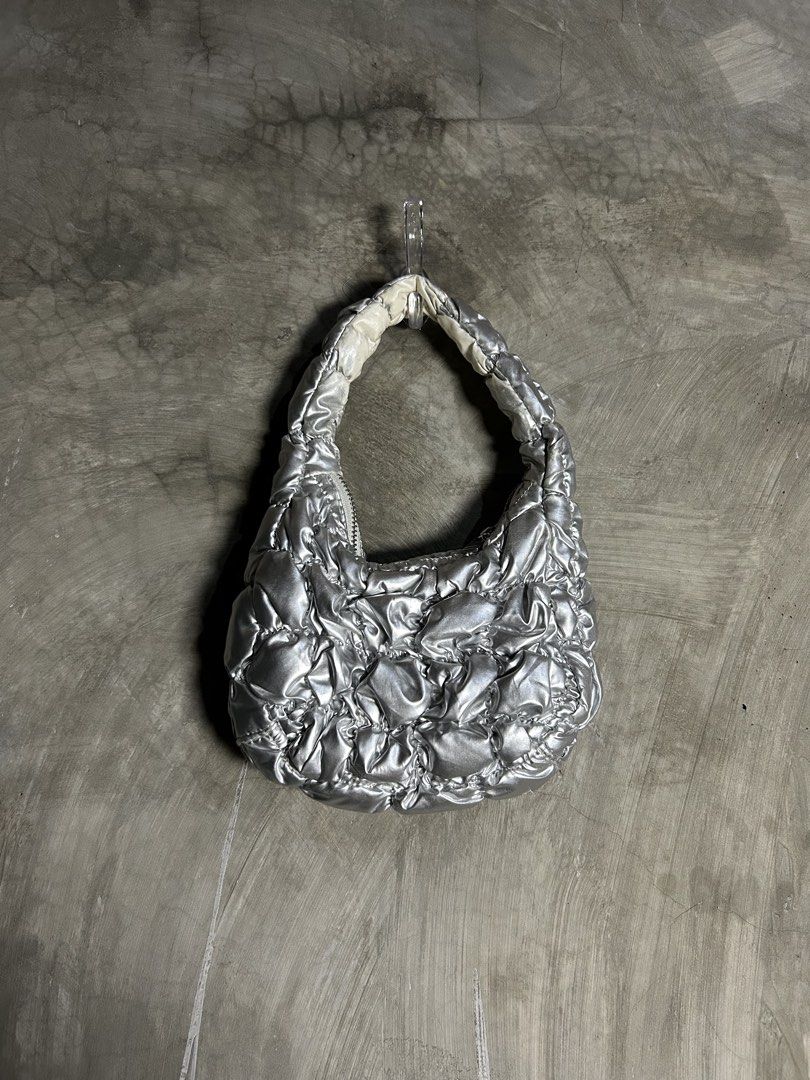 COS - Silver Quilted Micro Bag (Category: Purses & Pouches) located in Tayabas. Submitted by streetdepartment (Listing ID 1467999041, Image 1). Description: COS - Silver Quilted Micro Bag Very good condition Issue: the under part of the handle are faded Dm to purchase! Note: Manage your expectations as you are dealing with secondhand items. Color may vary due to lighting. No return / No refund! If you have other questions, feel free to message me