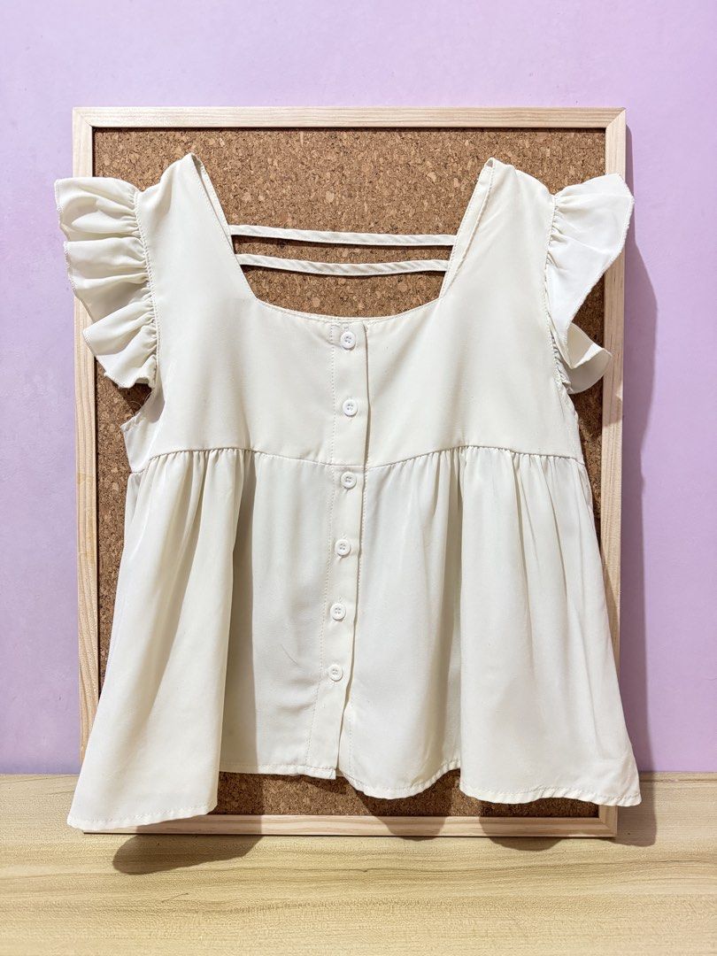Cream Baby Doll Top (Category: Blouses) located in Caloocan City. Submitted by elalaaaa (Listing ID 1467914224, Image 1). Description: .