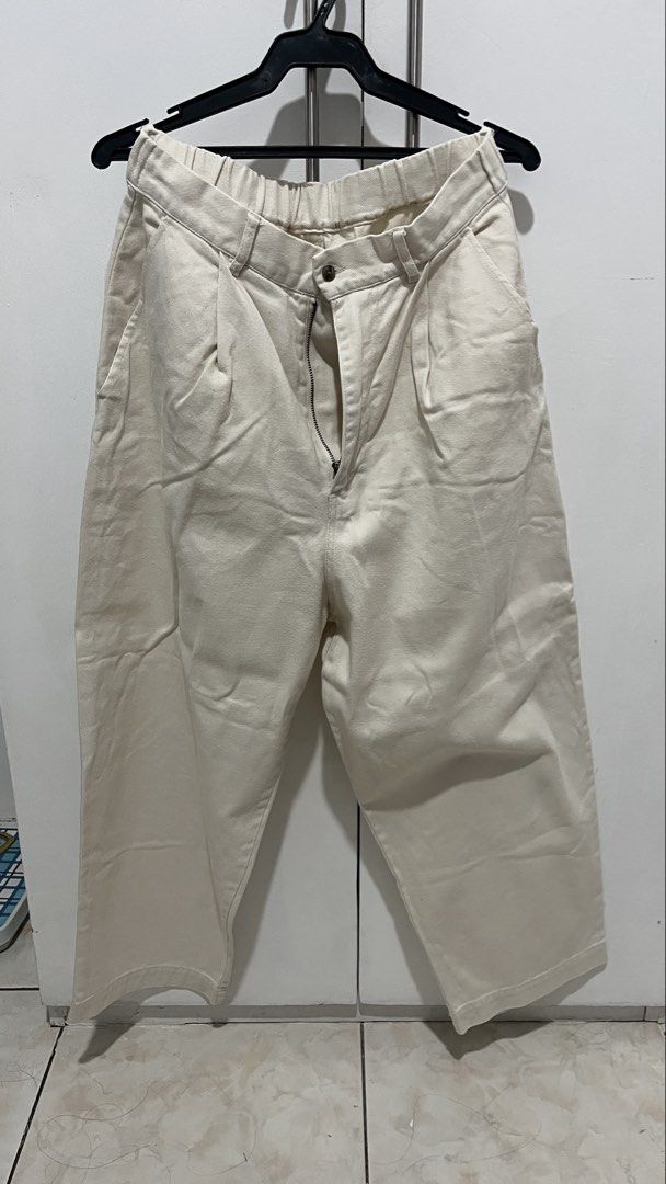 Cream beige pleated cropped trousers (Category: Other Bottoms) located in Makati City. Submitted by bsotelo (Listing ID 1468008409, Image 1). Description: - Color: Cream Beige - Fit: Wide leg, cropped length - Material: Heavy cotton/canvas - Details: Pleated front, zipper fly with button, belt loops - Comfort: Back elastic waistband for easy stretch - bought in japan.