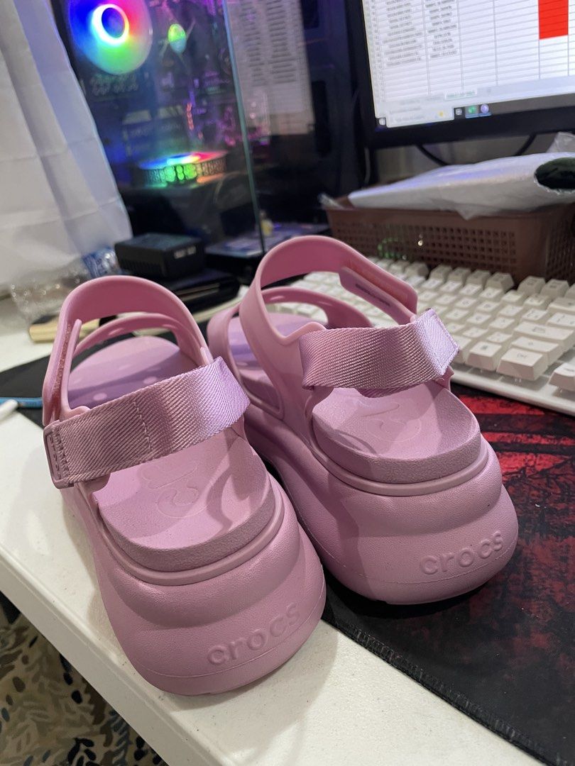 Crocs Pink Platform Sandals Size W7 (Category: Sandals) located in Caloocan City. Submitted by cheapfindsonlineshop (Listing ID 1467858617, Image 2). Description: - Trendy pink Crocs sandals with chunky platform soles - Size: Women's US 7 (W7) - Adjustable hook-and-loop fabric heel strap for a secure fit - Open toe design with ventilation holes on the top strap - Textured insoles for added grip and comfort - Made in China As is. Used once.