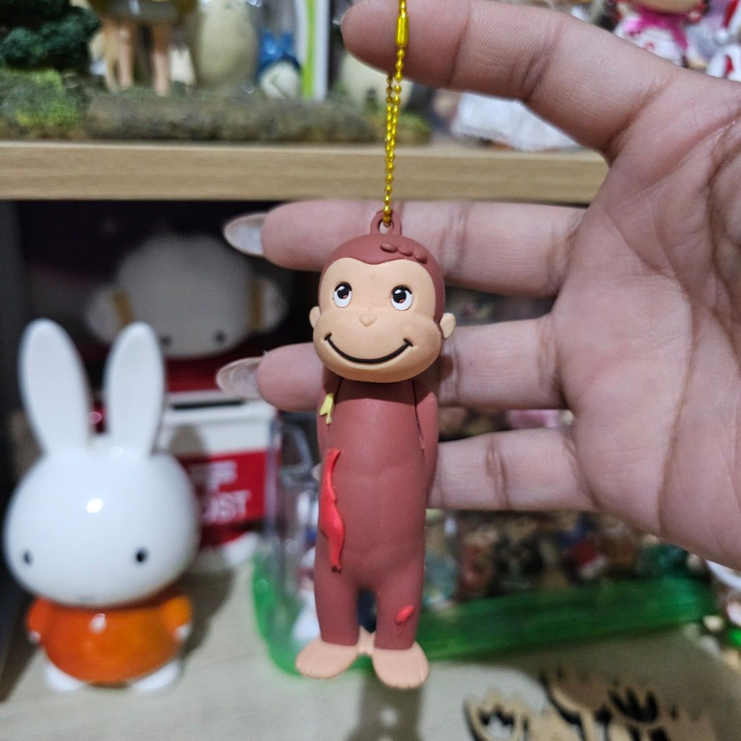 Curious George Figure Charm (Category: Character Goods) located in Manila. Submitted by lovelylovesjapan (Listing ID 1468040608, Image 1). Description: 🌸The item is on-hand and authentic from Japan 🌸Mode of Payment (MOP): GCASH/Bank Transfer 🌸Mode of Delivery (MOD): J&T or Lalamove (Shipping every Saturdays and Sundays) Notes: 🩷Breakable items are packed with care and caution. Seller will not be held liable for any damages incurred by the cou