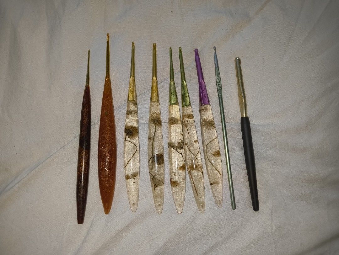 Custom Resin and Metal Crochet Hook Set (Category: Handmade Craft) located in Antipolo. Submitted by kei.regalado (Listing ID 1467918509, Image 1). Description: - Set of 9 crochet hooks featuring a mix of handmade resin handles with real pressed flowers and metallic styles - Japan size 2/0, 3/0, 4/0, 5/0, 6/0, 7/0, 8/0, Inox size 4, Susan Bates US size 10 (6.0mm) - Includes trusted brands like Tulip and Inox, plus custom pieces - Various hook siz