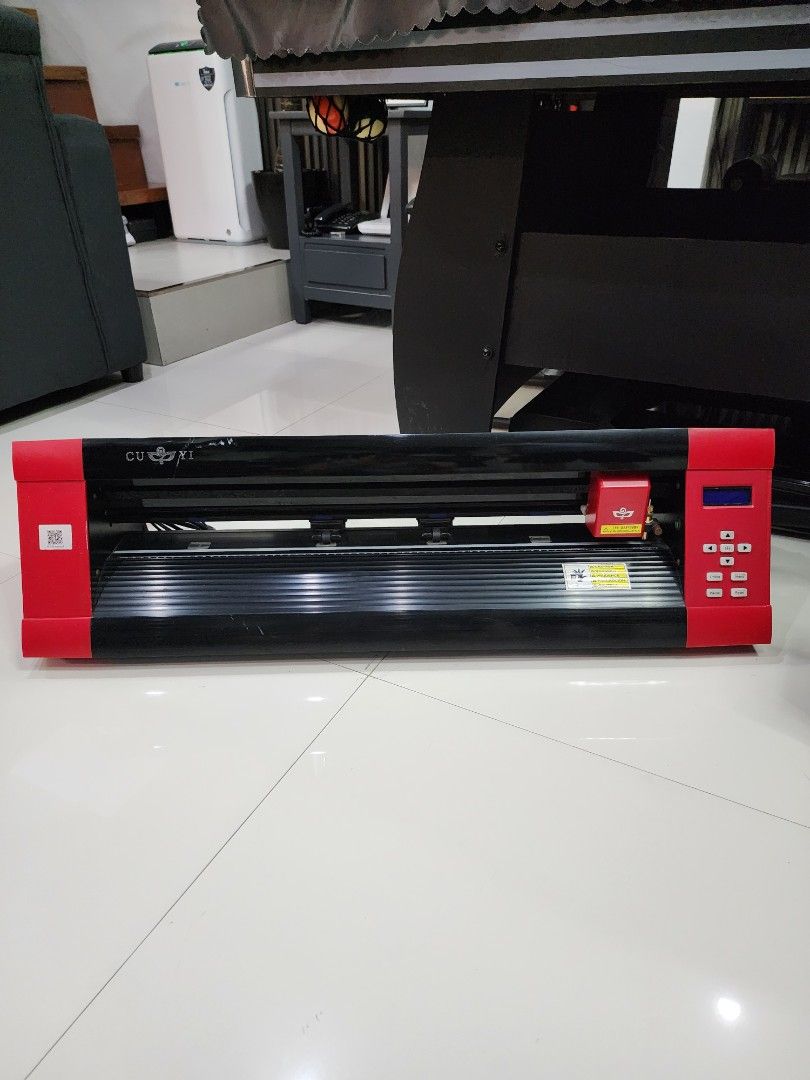 CUYI MK630 24" Cutter Plotter (Category: Craft Supplies & Tools) located in Quezon City. Submitted by pinkyshang (Listing ID 1468057814, Image 1). Description: - Red and Black vinyl cutter with digital control panel - Red carriage housing featuring an adjustable blade holder - Smooth roller tracks and reliable feed setup included - Convenient QR code sticker linking directly to the MK-U manual - Easy-to-use buttons for menu, reset, online, and pa