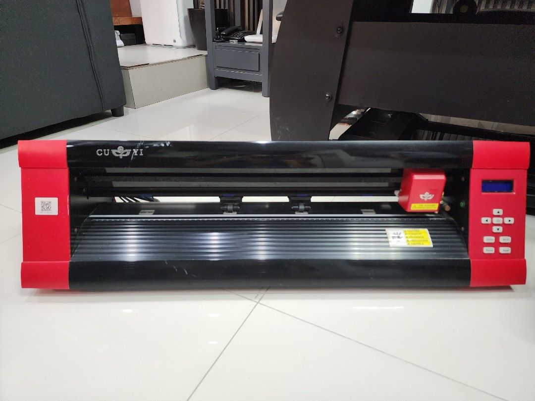CUYI MK630 24" Cutter Plotter (Category: Craft Supplies & Tools) located in Quezon City. Submitted by pinkyshang (Listing ID 1468057814, Image 2). Description: - Red and Black vinyl cutter with digital control panel - Red carriage housing featuring an adjustable blade holder - Smooth roller tracks and reliable feed setup included - Convenient QR code sticker linking directly to the MK-U manual - Easy-to-use buttons for menu, reset, online, and pa