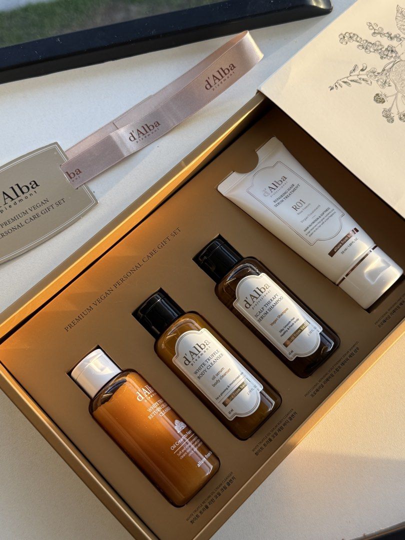 d'Alba Premium Vegan Personal Care Gift Set (Category: Body Care) located in Manila. Submitted by drdb29 (Listing ID 1468017142, Image 2). Description: - Brand new d'Alba premium vegan personal care gift set - Comes in a gorgeous decorative box with a ribbon, ready for gifting - Includes White Truffle Return Oil Cream Cleanser (15ml/full size depending on set) - Includes White Truffle Oil Serum Body Cleanser - Includes Scalp Therapy Serum Shampoo