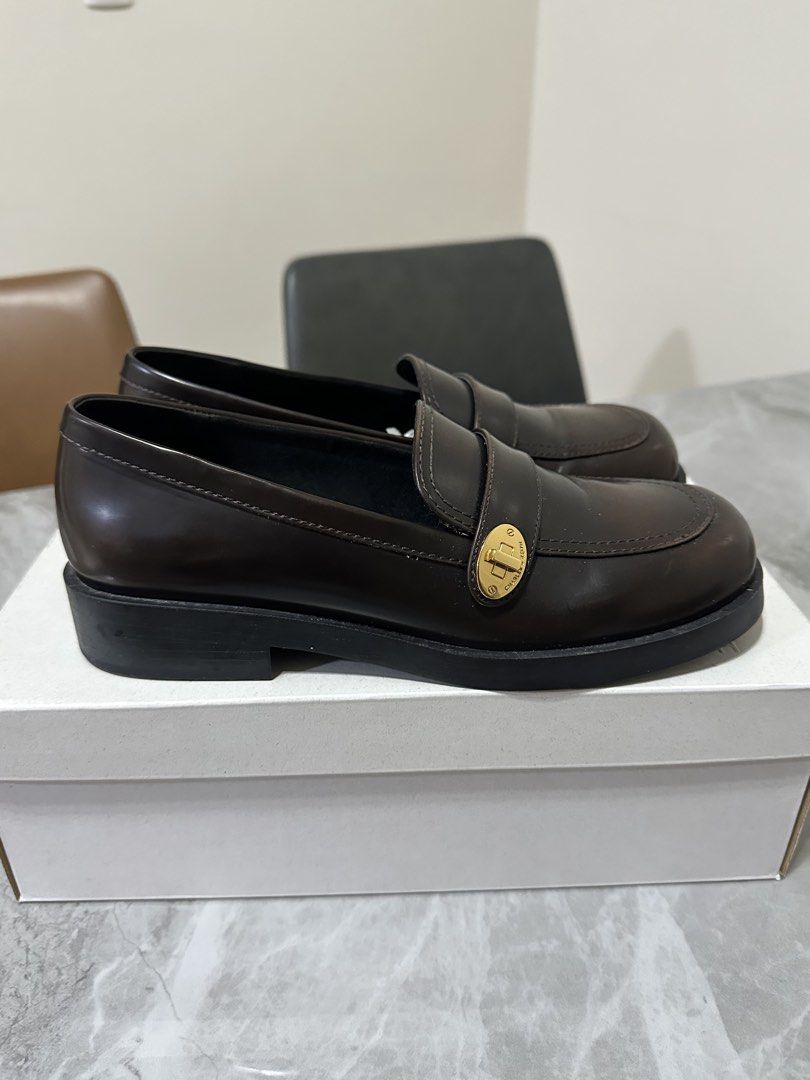 Charles & Keith DARK BROWN LOAFERS (Category: Loafers) located in Paranaque City. Submitted by safepenguin_c6a36a (Listing ID 1467998537, Image 2). Description: Charles & Keith Hettie Metallic-Buckle Strap Loafers in brown.