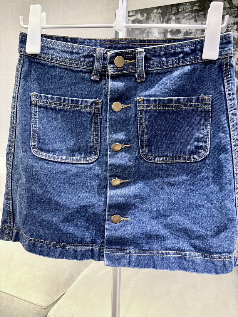 Dark denim mini skirt front button (Category: Skirts) located in Taguig. Submitted by annebydesign (Listing ID 1467979859, Image 2). Description: Hi everyone. Selling this Dark mini skirt front button for ₱200 •Like new. Bought in a bazaar- •Size Small. 25-26inches waist -14inches length Loc: Taguig BGC Mop: GCash/ BDO/ BPI Mod: Rider pick up.