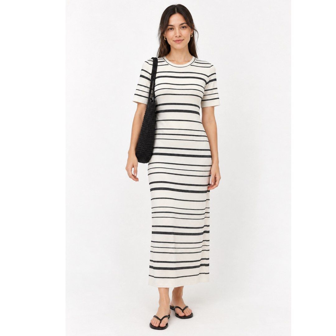 Declasse Off-White Striped Knit Midi Dress (Category: Dresses) located in San Jose del Monte. Submitted by vanessabarredo (Listing ID 1468052009, Image 1). Description: Minimalist Japanese-inspired knit dress featuring classic black textured horizontal stripes on an off-white base. Designed with a round neckline, short sleeves, and a flattering straight silhouette. Timeless and effortlessly chic. Condition: Excellent Color: Off-White / Black Fabr