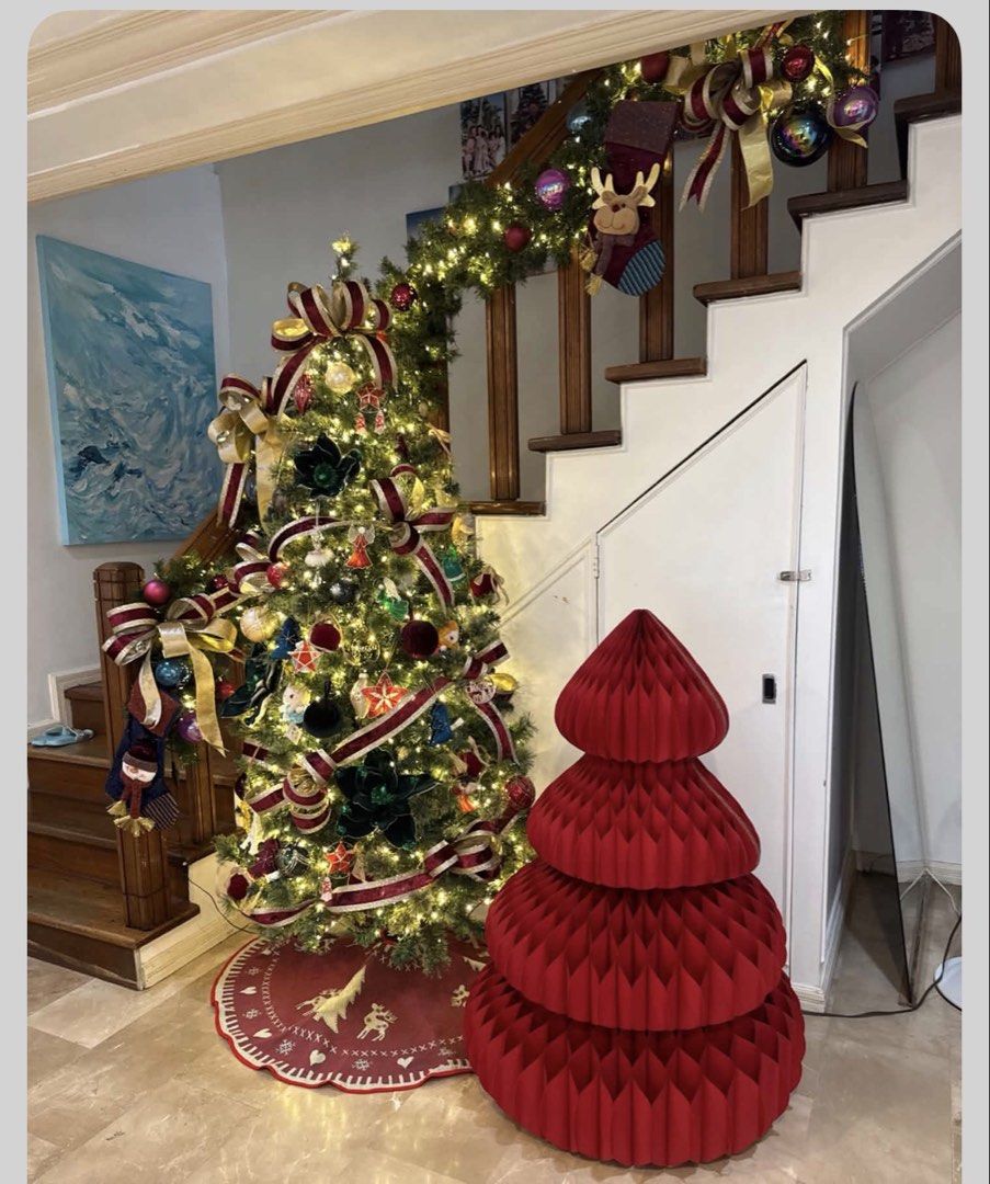 Decorated Artificial Christmas Tree with Red Honeycomb Paper Tree (Category: Artificial Plants & Flowers) located in Taguig. Submitted by tinldz (Listing ID 1467861826, Image 1). Description: - Complete holiday decor set: pre-lit artificial Christmas tree with warm lights - Elegantly decorated with red ribbons, ornaments, and green velvet flowers - Ideal for the living room or entryway - Hassle-free setup and easy to pack away after the holidays 