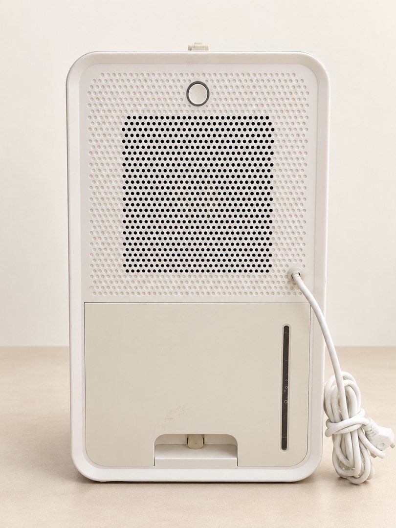 Dehumidifier with Water Tank and Vent Grille (Category: Air Purifiers & Dehumidifiers) located in Quezon City. Submitted by ShopNShip (Listing ID 1468004358, Image 2). Description: Dehumidifier (제습기) Daily dehumidification 0.75 liters/day Water tank capacity 1.89 liters Rated voltage 220V Frequency 60Hz Power consumption 40W Recommended coverage Up to 30 m² (approx. 323 sq ft) Dimensions (W × D × H) 20 × 13.8 × 35.8 cm Weight 2.5 kg Drainage Cont