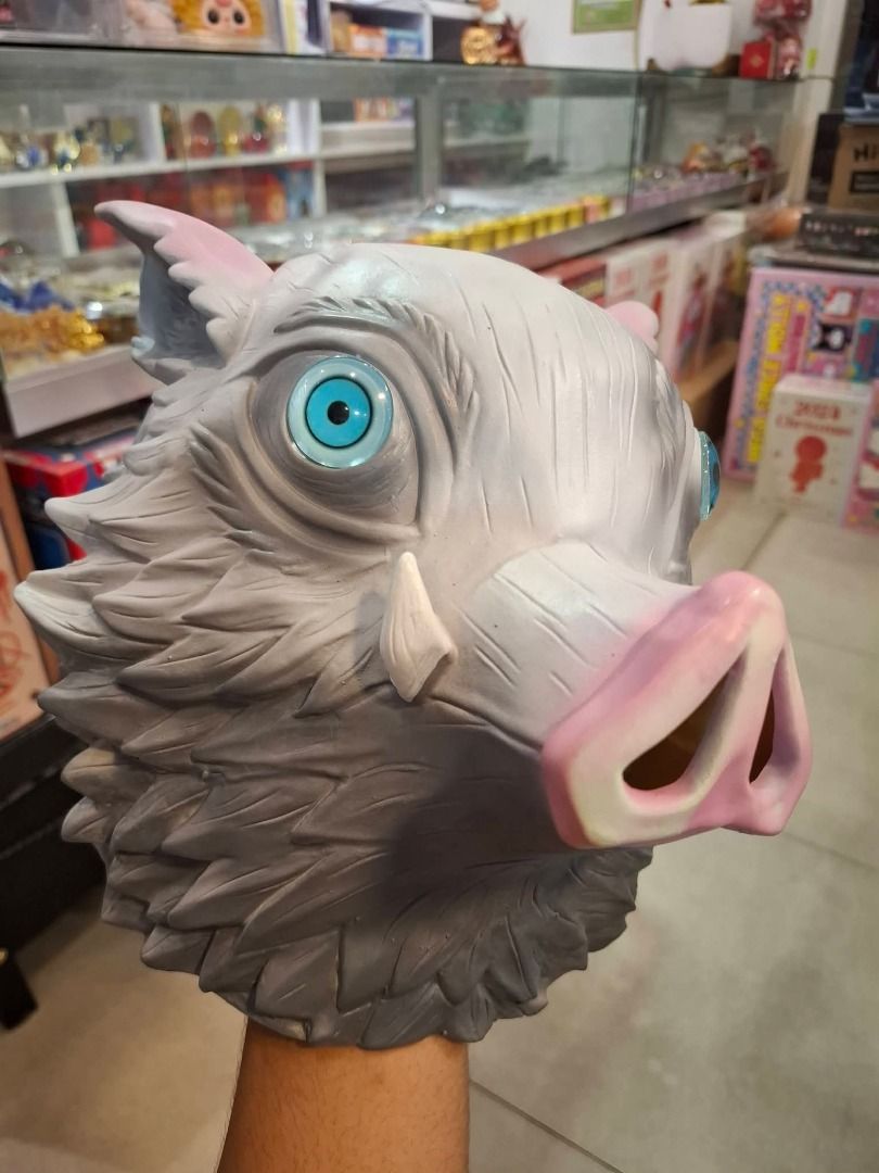 Demon Slayer - Inosuke Hashibira Boar Mask (Category: Figurines & Statues) located in Manila. Submitted by gin-sensei (Listing ID 1468040675, Image 1). Description: - Character: Inosuke Hashibira (Demon Slayer) - Design: Grey colored boar mask (Latex) - Vision: Bright blue mesh eyes with clear visibility through the snout - Fit: Standard adult head size - Ideal for: Cosplay events, Halloween parties, and collections Only wore twice during testing