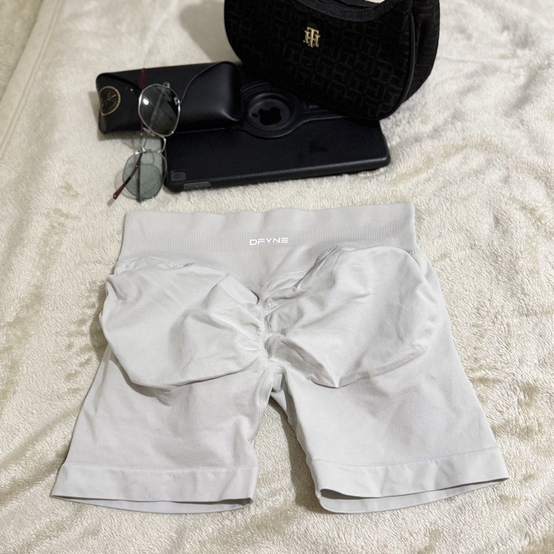DFYNE Grey Ribbed Workout Shorts (Category: Activewear) located in Caloocan City. Submitted by bellita_05 (Listing ID 1468001254, Image 1). Description: DFYNE workout shorts in light grey. High ribbed waistband with brand logo on the front and inner text. Sculpting seam details on the back. Stretchy fabric, super comfortable for gym sessions or running errands. Great addition to activewear wardrobe..