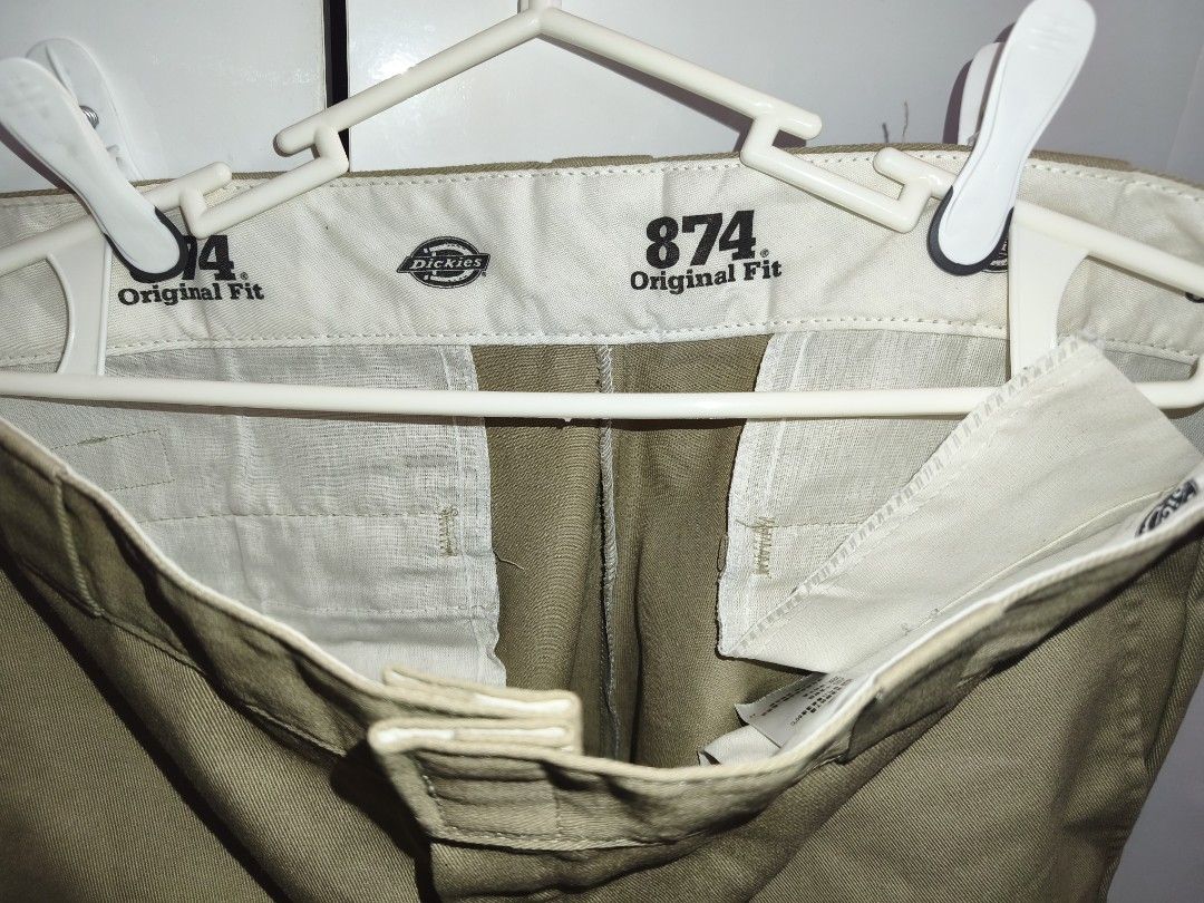 Dickies 874 Work Pants Khaki size 34 (Category: Chinos) located in Paranaque City. Submitted by seth.fernand0 (Listing ID 1468023582, Image 3). Description: Dickies 874 Original Fit - Color: Khaki - Size: 34x32 - Condition: 9/10, used less than 5 times, still stiff. - Fit: Straight leg cut. Bought in 2023 before Dickies phased out of Philippine market. DM for more details. Also selling sz 34 Dickies 874s in black and brown, check my profile for t