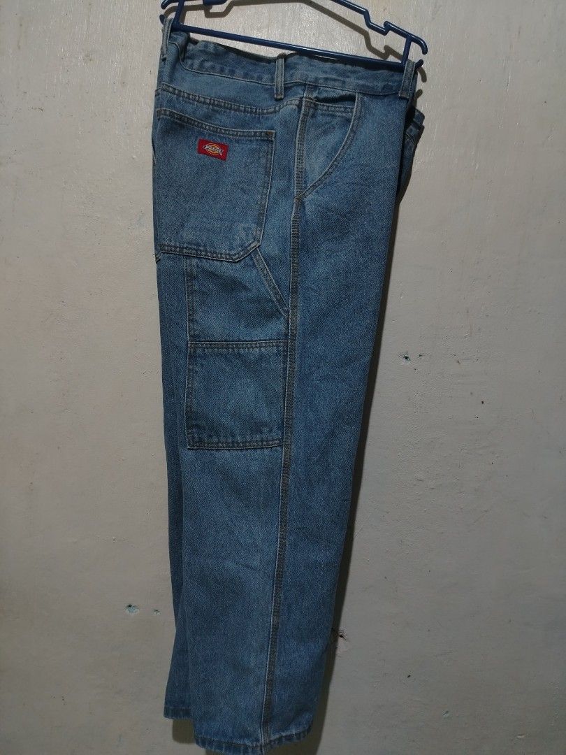 Dickies Blue Denim Carpenter Pants (Category: Jeans) located in Rizal. Submitted by gmpastoffi75031 (Listing ID 1467918718, Image 3). Description: - Brand: Dickies - dimes waist 36 length 38 - Color: Classic blue denim - Fit: Relaxed straight leg - Features: Utility style, multiple side pockets, and a hammer loop - Details: Iconic red Dickies logo patch on the back pocket - Condition/Style: Great everyday workwear piece - missing tag.