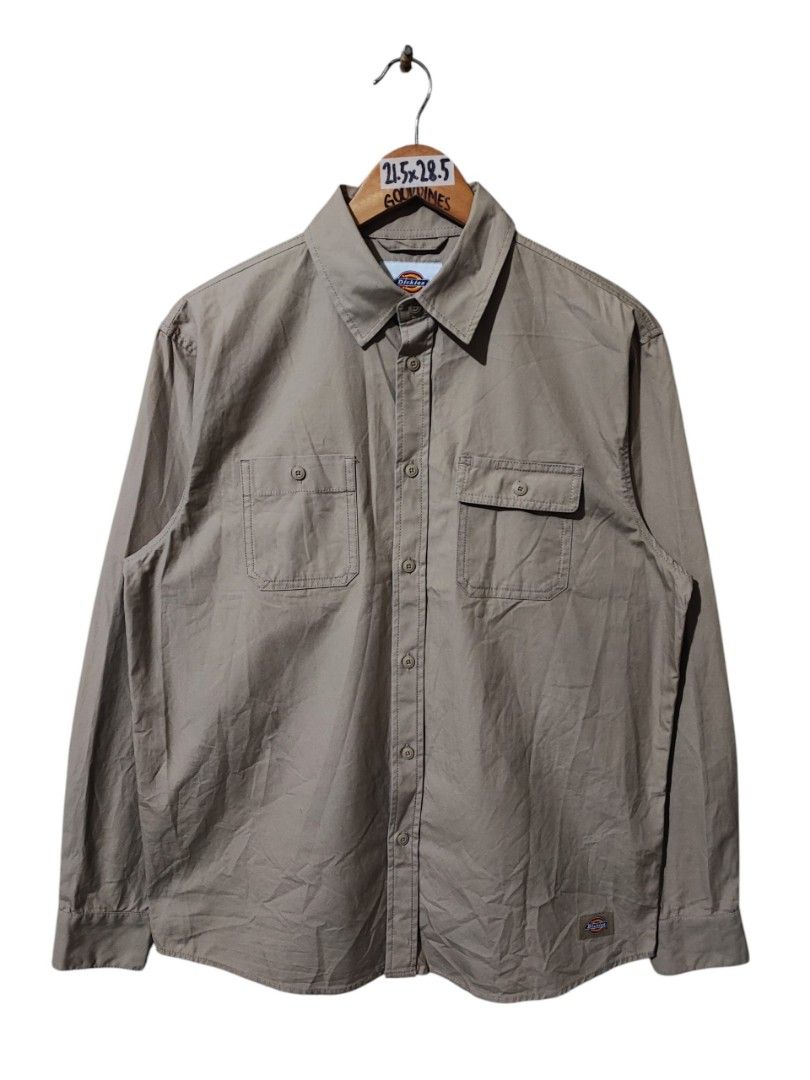 DICKIES POPLIN LONG SLEEVE SHIRT (Category: Formal Shirts) located in Iloilo. Submitted by gooddimes (Listing ID 1468039483, Image 1). Description: Dickies Poplin Long Sleeve Shitt Authentic Embroidery Dickies Back Logo Desert Sand Colorway Size on tag: Medium Dimes: 21.5Wx28.5L Issue/s: None Color rate: 10/10 Like new condition ₱1,350 Reminders: - All items are thrifted, please manage your expectations - Color may vary due to lighting - Please w