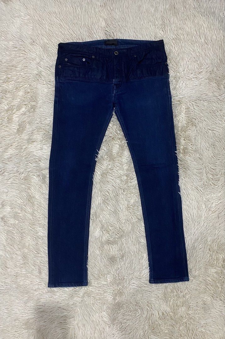 Diesel Black Gold Blue Quilted Panel Jeans Size 33 (Category: Jeans) located in Manila. Submitted by switchcity (Listing ID 1467878747, Image 1). Description: - Brand: Diesel Black Gold - Style: Regular straight fit denim jeans - Color: Dark blue / indigo wash - Size: 33 waist (tagged) - Design: Unique quilted nylon upper panel with branded metal buttons and pocket label - Material: Premium mixed material construction - Condition: Excellent desig