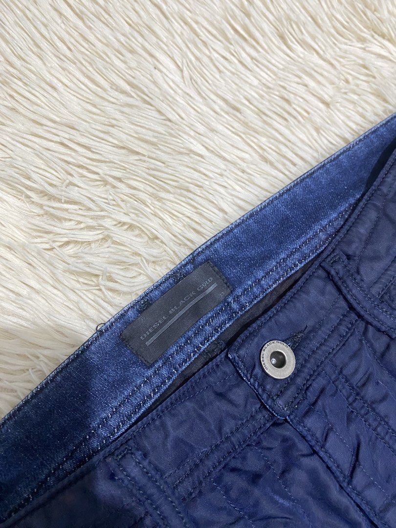 Diesel Black Gold Blue Quilted Panel Jeans Size 33 (Category: Jeans) located in Manila. Submitted by switchcity (Listing ID 1467878747, Image 2). Description: - Brand: Diesel Black Gold - Style: Regular straight fit denim jeans - Color: Dark blue / indigo wash - Size: 33 waist (tagged) - Design: Unique quilted nylon upper panel with branded metal buttons and pocket label - Material: Premium mixed material construction - Condition: Excellent desig