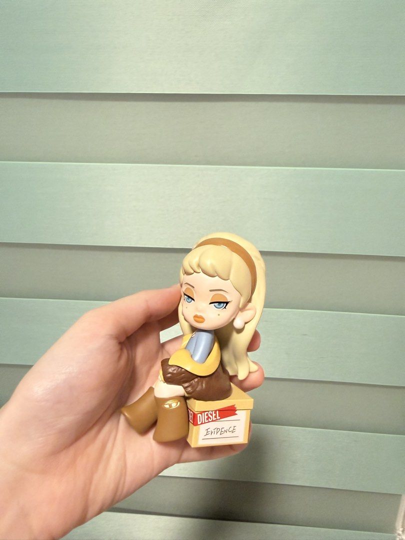 Diesel Collectible Figure (Category: Designer & Blind Box Toys) located in Balanga. Submitted by liiiizzzzzzzzz (Listing ID 1468020723, Image 3). Description: - with card - Includes a cute, miniature matching blue handbag accessory .