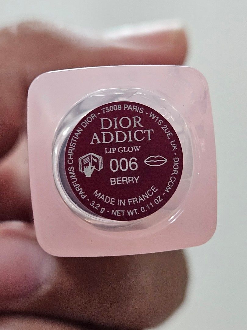 Dior Addict Lip Glow 006 Berry (Category: Makeup) located in Makati City. Submitted by margherita.avenue (Listing ID 1467855832, Image 2). Description: - Brand: Dior - Product: Addict Lip Glow Tinted Lip Balm - Shade: 006 Berry - Size: Standard (3.2g) - Origin: Made in France - Packaging: Iconic pink case with silver branding - Authenticity: Genuine product label on the bottom base - Condition: no box, slightly used. bought from singapore last Ju