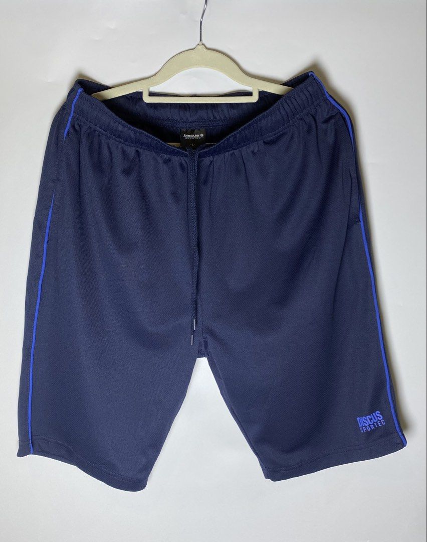 Discuss sportec shorts size L (Category: Shorts) located in Makati City. Submitted by indaysukaycloset (Listing ID 1467906724, Image 1). Description: DISCUS SPORTEC Shorts - Size L Details: - Brand: DISCUS SPORTEC - Size on tag: L - Color: Navy Blue with Royal Blue piping - Condition: Good / Like New, no flaw - Gender: Men's / Unisex -good quality and authentic Features: - Garterized waist with drawstring - Dri-fit jersey fabric, light & comfy - 