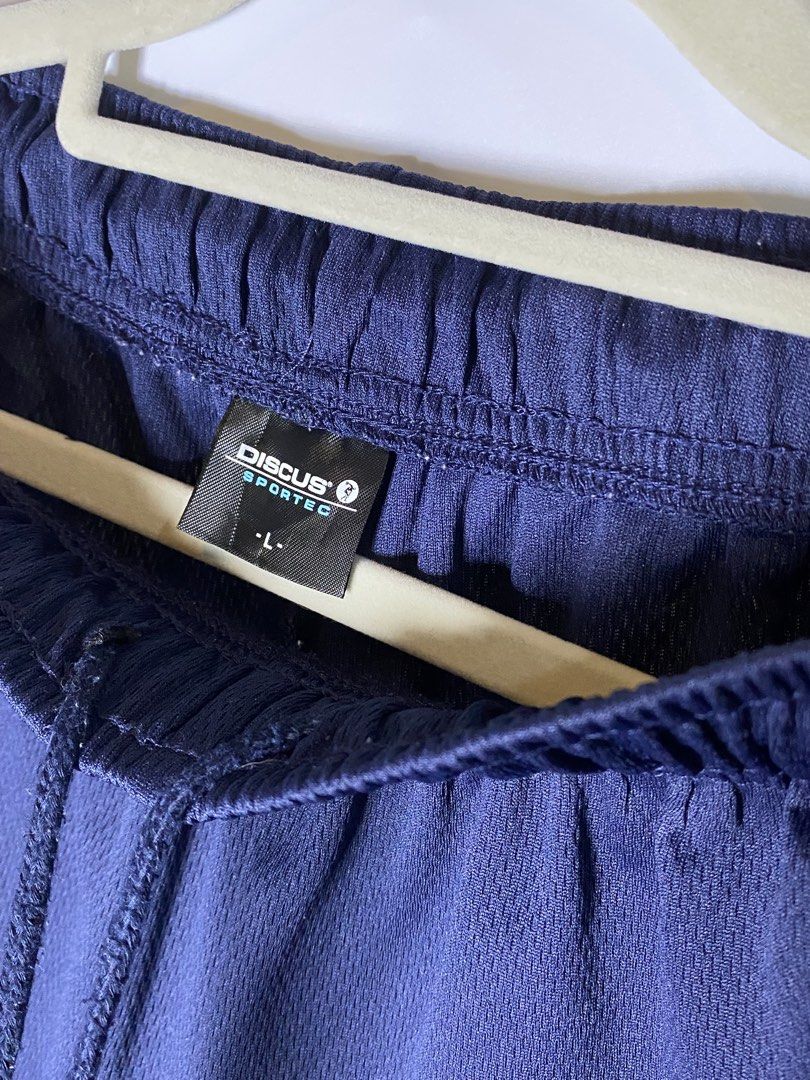 Discuss sportec shorts size L (Category: Shorts) located in Makati City. Submitted by indaysukaycloset (Listing ID 1467906724, Image 2). Description: DISCUS SPORTEC Shorts - Size L Details: - Brand: DISCUS SPORTEC - Size on tag: L - Color: Navy Blue with Royal Blue piping - Condition: Good / Like New, no flaw - Gender: Men's / Unisex -good quality and authentic Features: - Garterized waist with drawstring - Dri-fit jersey fabric, light & comfy - 