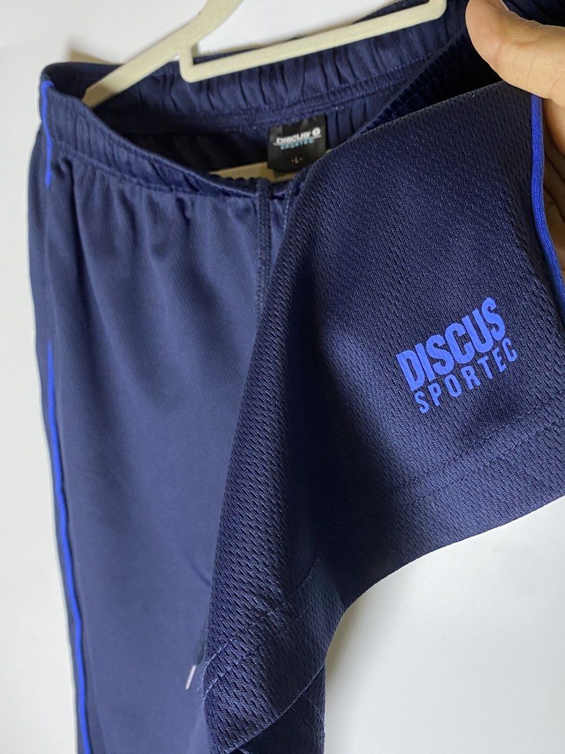 Discuss sportec shorts size L (Category: Shorts) located in Makati City. Submitted by indaysukaycloset (Listing ID 1467906724, Image 3). Description: DISCUS SPORTEC Shorts - Size L Details: - Brand: DISCUS SPORTEC - Size on tag: L - Color: Navy Blue with Royal Blue piping - Condition: Good / Like New, no flaw - Gender: Men's / Unisex -good quality and authentic Features: - Garterized waist with drawstring - Dri-fit jersey fabric, light & comfy - 