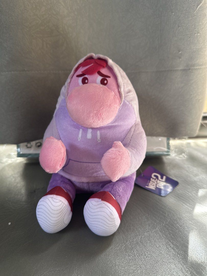 Disney Pixar Inside Out 2 Envy Plush (Category: Plushies & Soft Toys) located in Cainta. Submitted by shopbyyna (Listing ID 1467872293, Image 1). Description: - Official Disney Pixar Inside Out 2 Envy plush toy - Outfit: Purple hoodie, matching pants, and white sneakers - Condition: Brand new with original tag still attached - Fabric is clean and filling is super soft - Perfect for collectors and fans of all ages.