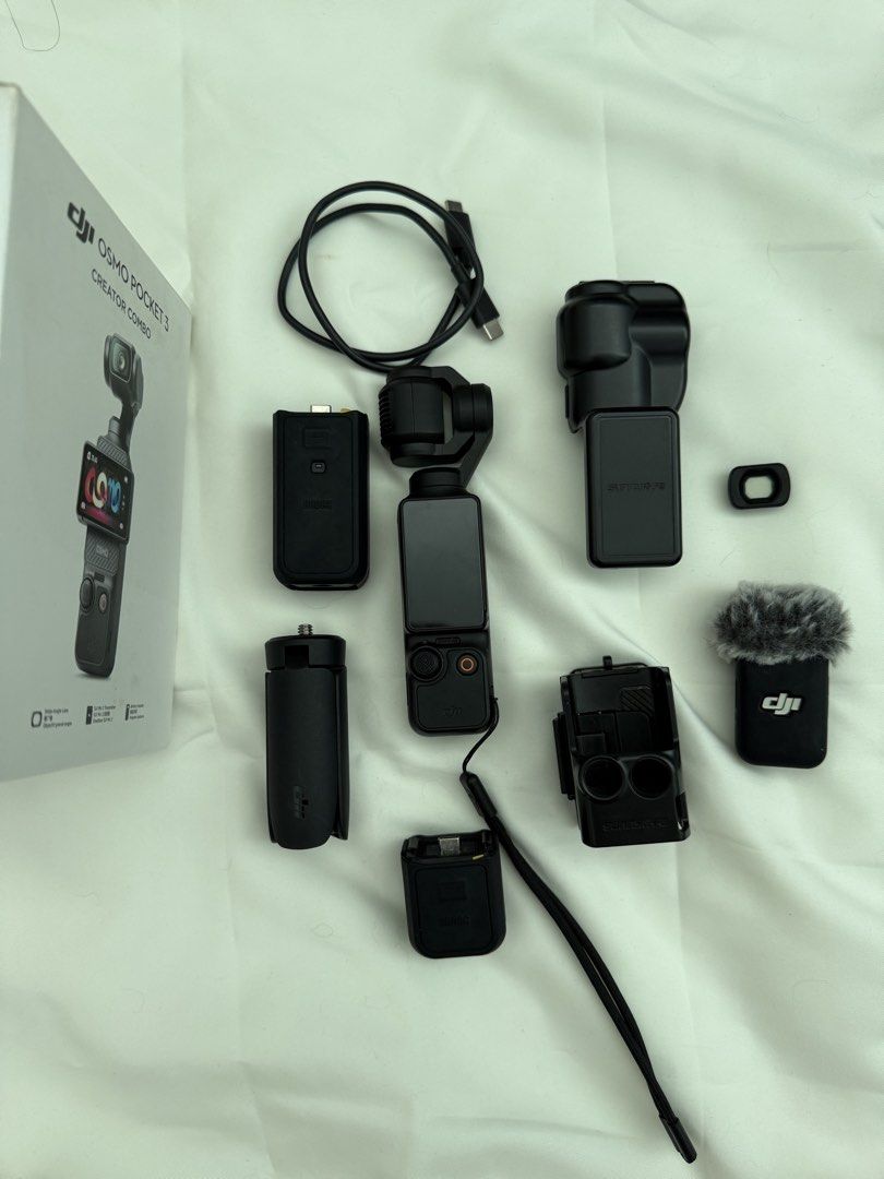 DJI Osmo Pocket 3 Creator Combo (Category: Video Cameras) located in Manila. Submitted by shaznay17 (Listing ID 1467870594, Image 2). Description: **FOR SALE: ** Selling my DJI Osmo Pocket 3 Creator Combo! Perfect for vlogging, travel, content creation, and everyday videos. Great for anyone looking for a compact camera with smooth, stabilized footage. Inclusions: * DJI Osmo Pocket 3 * Creator Combo accessories * 128GB memory card * Other accessor