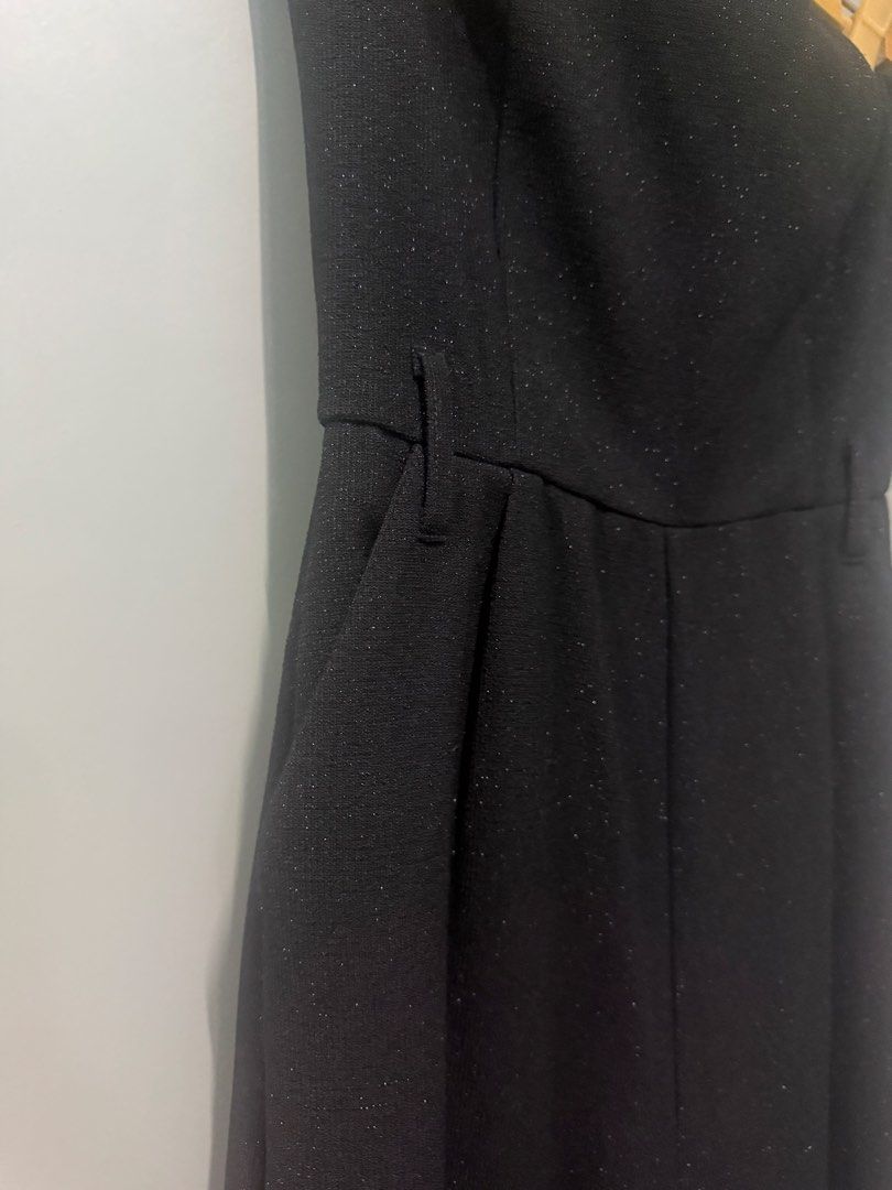 DO+BE Jumpsuit (Category: Jumpsuits) located in Caloocan City. Submitted by calmphoenix.d298a7 (Listing ID 1467967399, Image 3). Description: - Brand: DO+BE - Style: Black strapless jumpsuit with subtle glitter - Fit: Structured bodice and wide-leg cut - Details: Includes belt loops and exposed back zipper - Occasion: Ideal for evening parties and night outs - Mode of Payment / Shipping: MOP via GCash/Bank Transfer, SF via J&T (Buyer's expense).