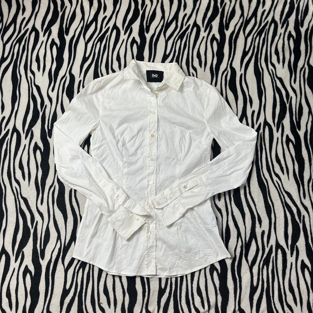 DOLCE & GABBANA WHITE BOTTON DOWN (Category: Longsleeves) located in Manila. Submitted by royaldripmanila (Listing ID 1467957518, Image 1). Description: No issue W17 L26.