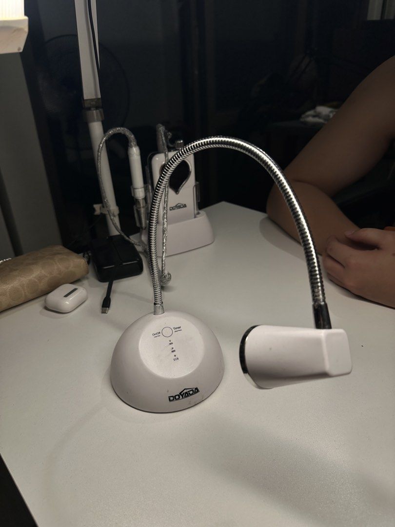 Doyada UV LED Flexible Gooseneck Giraffe Lamp (Category: Hands & Nails) located in Quezon City. Submitted by luc1enne (Listing ID 1467991646, Image 1). Description: - Condition: Working properly and powers on - No damages, no issues - Features: 30s and 60s timer buttons on top - Chargeable - Sensor.