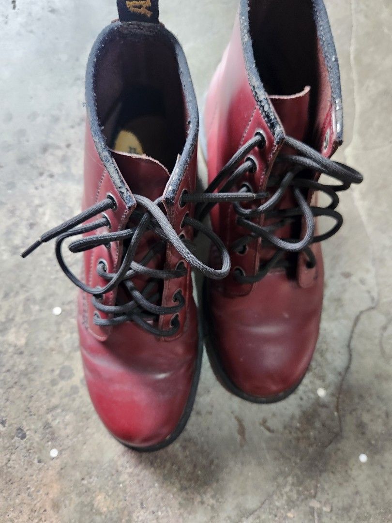 Dr. Martens 1460 Cherry Red Boots (Category: Boots) located in Quezon City. Submitted by amber___18 (Listing ID 1467876943, Image 3). Description: - Authentic Dr. Martens 1460 8-eye boots in a striking cherry red color - Classic smooth leather upper with iconic yellow welt stitching and AirWair heel loops - Durable bouncing soles with standard tread for everyday comfort - Condition: Normal creasing across the toes and minor peeling on the leather
