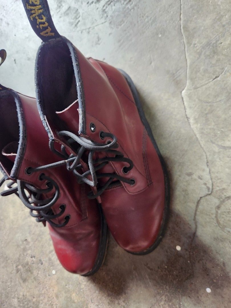 Dr. Martens 1460 Cherry Red Boots (Category: Boots) located in Quezon City. Submitted by amber___18 (Listing ID 1467876943, Image 2). Description: - Authentic Dr. Martens 1460 8-eye boots in a striking cherry red color - Classic smooth leather upper with iconic yellow welt stitching and AirWair heel loops - Durable bouncing soles with standard tread for everyday comfort - Condition: Normal creasing across the toes and minor peeling on the leather