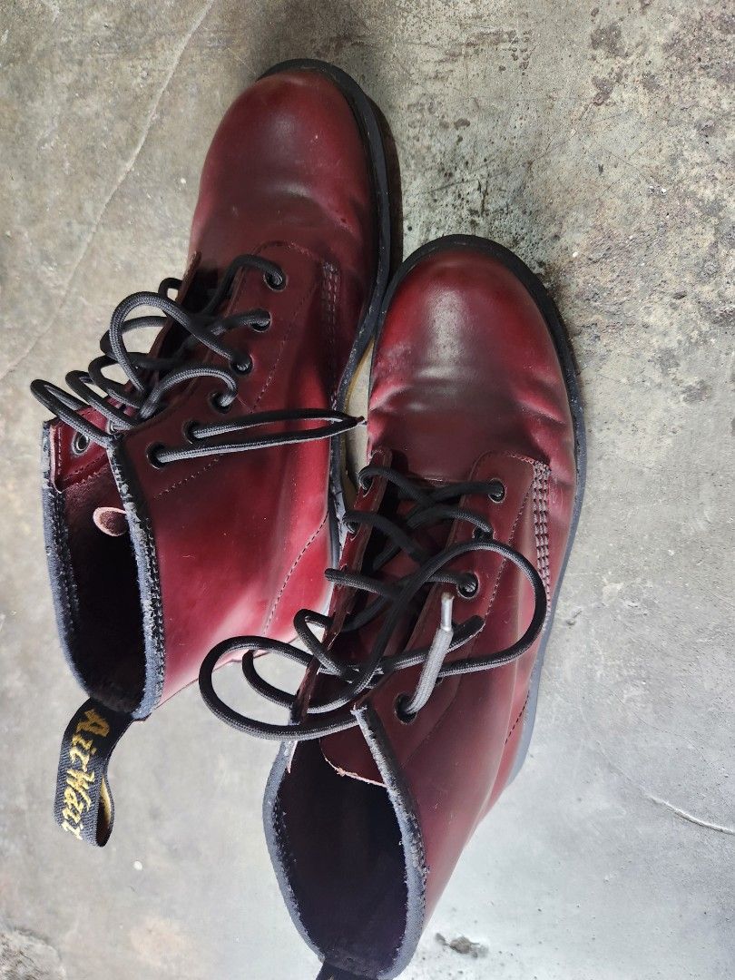 Dr. Martens 1460 Cherry Red Boots (Category: Boots) located in Quezon City. Submitted by amber___18 (Listing ID 1467876943, Image 1). Description: - Authentic Dr. Martens 1460 8-eye boots in a striking cherry red color - Classic smooth leather upper with iconic yellow welt stitching and AirWair heel loops - Durable bouncing soles with standard tread for everyday comfort - Condition: Normal creasing across the toes and minor peeling on the leather