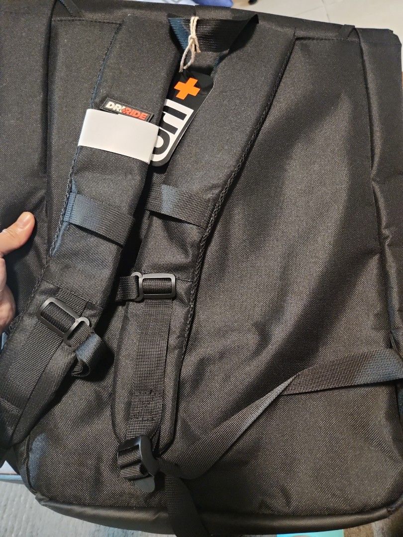 Dr Ride Black Backpack Bag (Category: Backpacks) located in Pasay City. Submitted by dqueen28 (Listing ID 1468000853, Image 1). Description: SRP 2,405 - Brand new with Dr Ride tag attached - Sleek black design with a stylish white strap accent on one shoulder - Comfortable padded back area for all-day wear - Sturdy shoulder straps with adjustable buckles - Extra webbing straps for a secure and snug fit - Durable and reliable for daily use, school