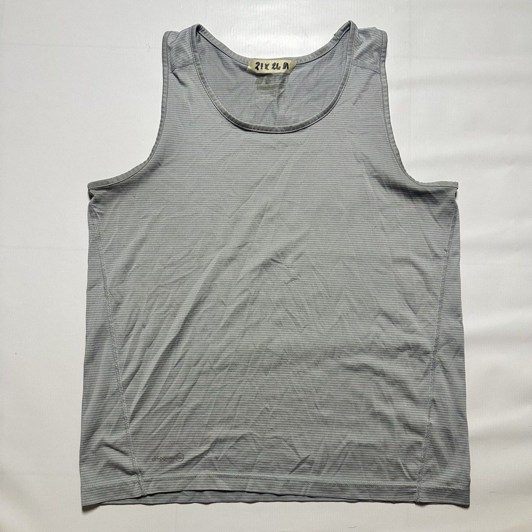 Dri-Power 360 Grey Striped Athletic Tank Top (Category: Tshirts & Polo Shirts ) located in Gapan. Submitted by rasthriftshop17 (Listing ID 1468003483, Image 1). Description: RUSSELL Tanktops Size on tag: M Dimes: 21 x 26 Condition: Excellent Color rate: 9.9/10 Issue: None.