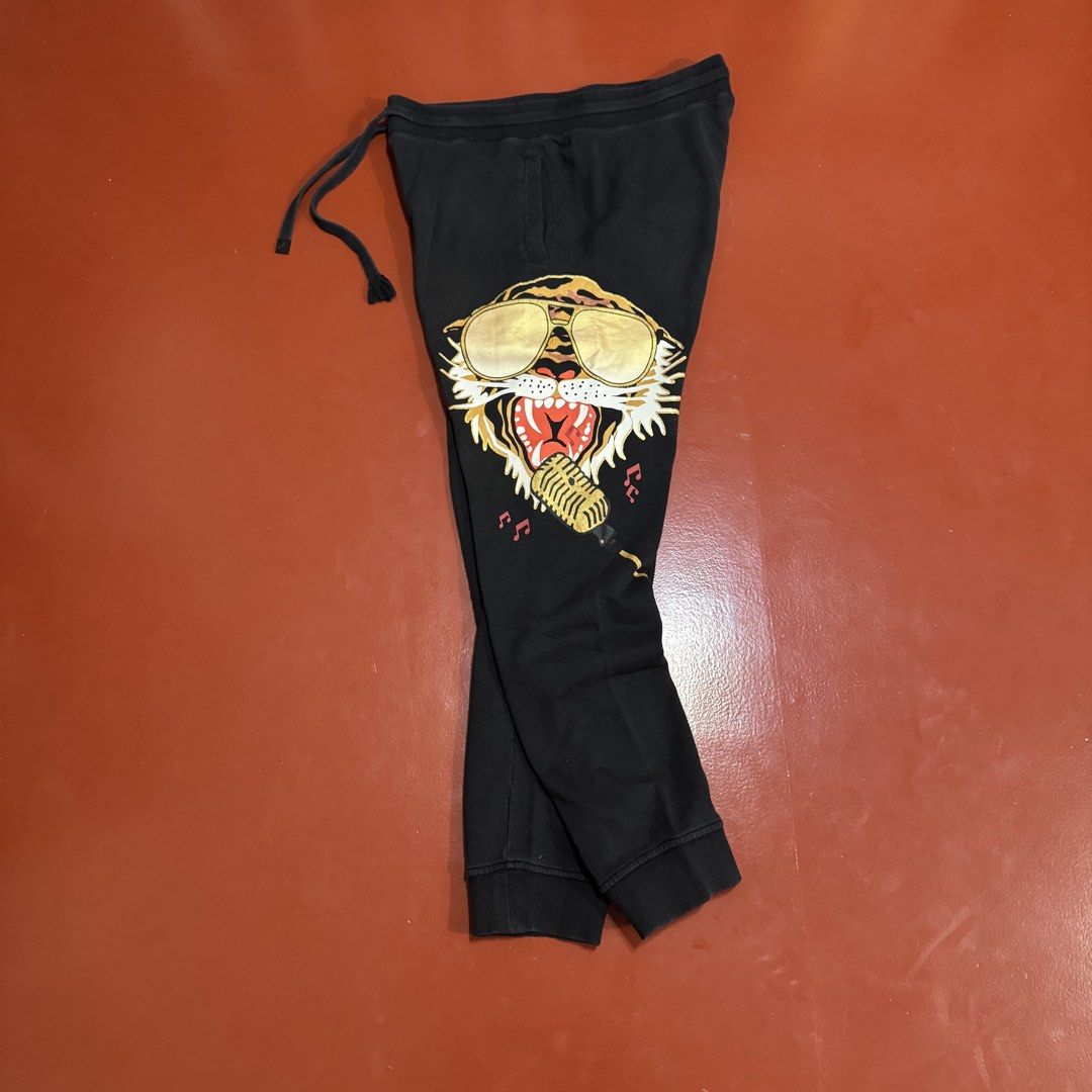 ED HARDY JOGGER SWEATPANTS (Category: Joggers) located in Pasig City. Submitted by buzzthrifty (Listing ID 1467975693, Image 1). Description: SIZE 32-38WAIST 39"LENGTH EXCELLENT CONDITION .