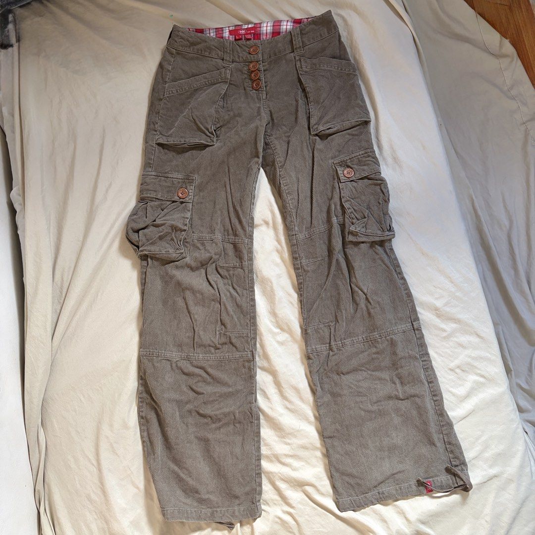 edc by Esprit Corduroy Cargo Pants Brown Y2K (Category: Jeans) located in Mandaluyong City. Submitted by afterceej (Listing ID 1467913749, Image 2). Description: - Brand: edc by Esprit - Style: Vintage utilitarian brown corduroy cargo pants - Fit: Mid-rise with multiple leg utility pockets - Details: Branded wooden buttons with a button-up fly - Unique touches: Red plaid inner waistband lining and crossover back belt loop 📍 Mandaluyong 🚚 Shippi