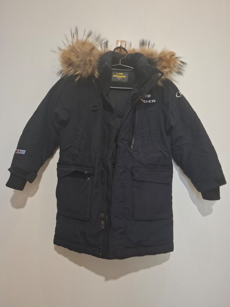 Eider Down Parka with Fur Hood (Category: Babies & Kids Fashion) located in Imus. Submitted by maggieforce (Listing ID 1467921851, Image 1). Description: - size 120 on tag - Brand: Eider - Color: Black - Insulation: Thick down for maximum warmth - Hood: Large with fluffy brown faux fur trim - Pockets: Multiple front utility pockets with snap buttons and zippers - Cuffs: Ribbed inner cuffs to block the wind - Details: Branded logo on chest and sho