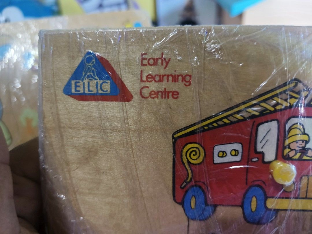 ELC Wooden Peg Puzzles Transport and Animals Bundle (Category: Educational & Learning Toys) located in Caloocan City. Submitted by mckysprelove (Listing ID 1467879010, Image 3). Description: - Pre loved ELC Wooden Puzzle -Set of 2 wooden peg puzzles from Early Learning Centre - Board 1 features vehicles: fire truck, ambulance, and double-decker bus - Board 2 features farm animals: sheep, donkey, and rooster - Designed with easy-to-grab wooden kno