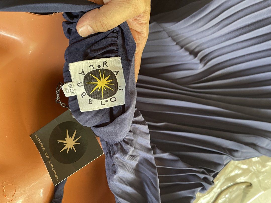 Electric pleated halter dress (Category: Dresses) located in Mandaluyong City. Submitted by coolmeybab (Listing ID 1467966917, Image 3). Description: Rajo Laurel unused (with tag) long dress Halter neckline Electric pleated .