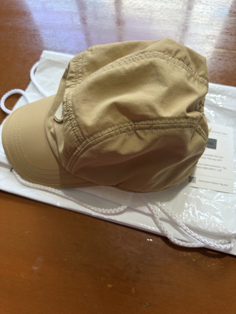 EMIS Heart Rubber Patch Camp Cap (Category: Hats & Beanies) located in Pasay City. Submitted by bbdavid (Listing ID 1467899620, Image 3). Description: - Brand new with original tags and plastic packaging - Authentic EMIS beige cap with front heart logo patch - Comfortable adjustable elastic back strap - Stylish embroidered text on back panels - Features interior mesh lining.