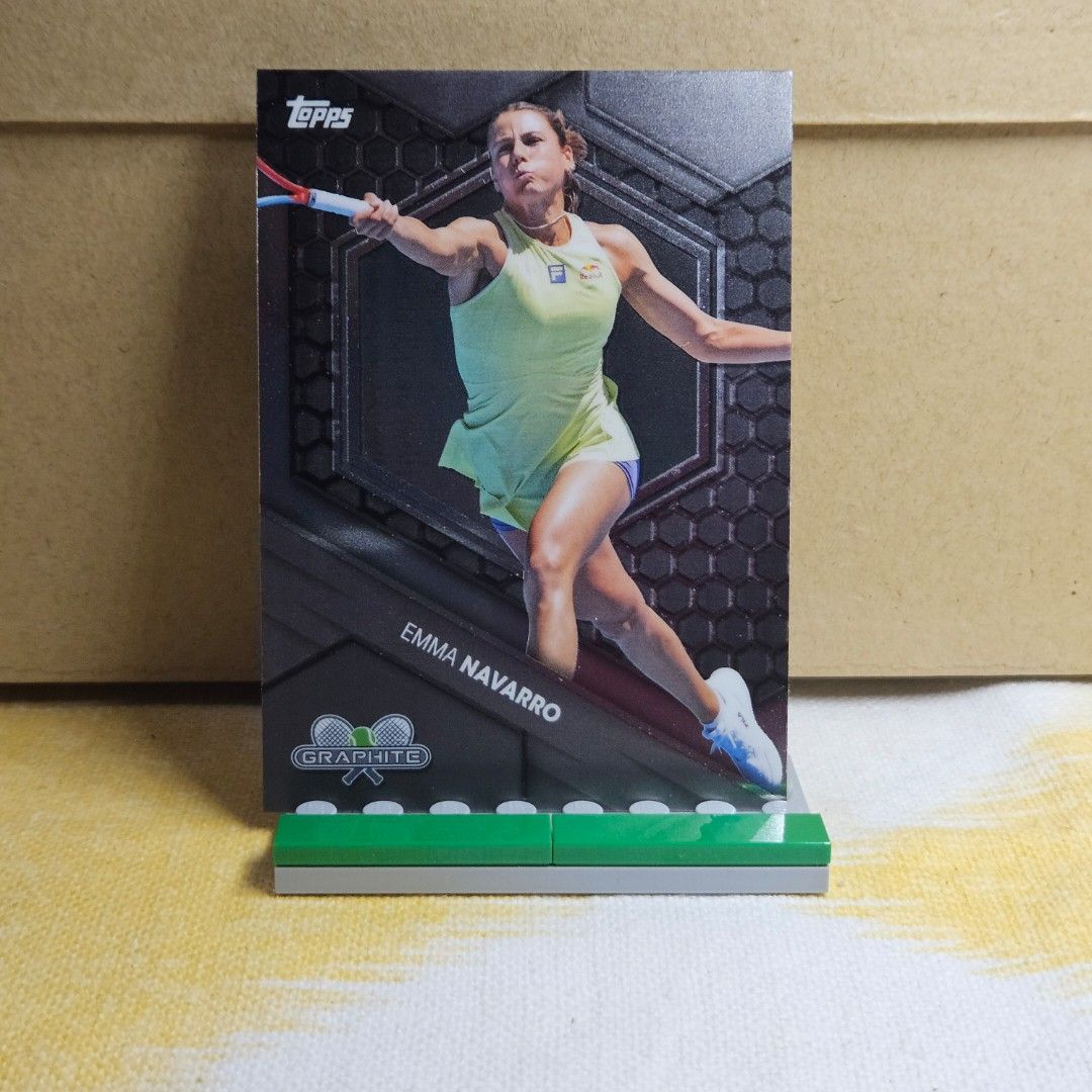 Emma Navarro (Category: Raw Singles) located in Las Pinas. Submitted by kapkards (Listing ID 1467876057, Image 1). Description: - Player: Emma Navarro - Set: Topps Graphite - Design: Mid-match action shot with dark honeycomb background, official Topps logo, and Graphite branding - Condition: Clean edges and sharp corners - Ideal for: Tennis enthusiasts and sports card collectors - Shipping: Packed securely to ensure safe delivery.