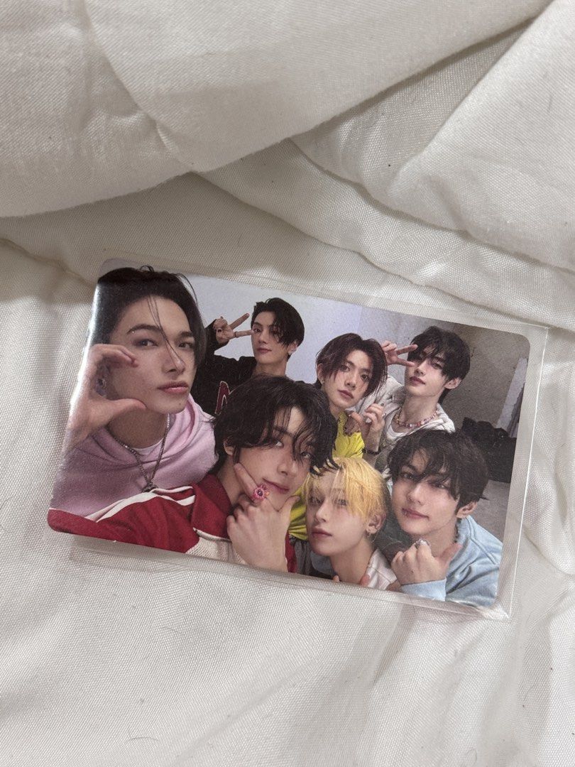 ENHYPEN Romance Untold Group Photocard Digital Code (Category: K-Wave Merchandise) located in Manila. Submitted by livelaughlovejay (Listing ID 1467972222, Image 1). Description: - Official ENHYPEN Romance Untold album inclusion - Features group selfie with all members in casual outfits - Includes unused digital code on the back - Packaged safely with cardboard backing for shipping.
