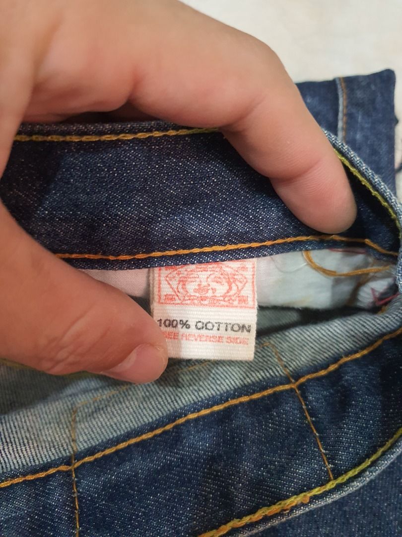 Evisu Embroidered Eagle Denim Jeans Size 32 (Category: Jeans) located in Caloocan City. Submitted by cleverwind_1e53ab (Listing ID 1467871780, Image 3). Description: - Brand: Evisu - Size: Tagged 32 - Color: Dark blue wash - Material: 100% heavyweight cotton - Design: Detailed eagle and flower embroidery on the back leg - Details: Classic contrast stitching, clean interior labels, and intact back patch - Condition: Excellent pre-loved condition -